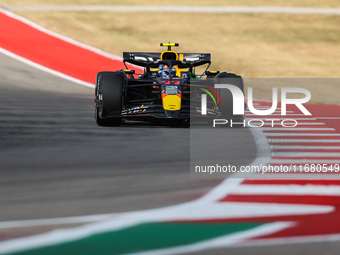 Sergio Perez drives in a free practice session at Circuit of the Americas in Austin, United States, on October 18, 2024, during the Formula...