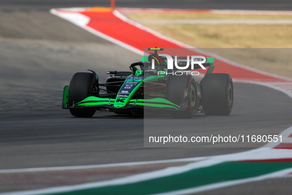 Zhou Guanyu drives in a free practice session at Circuit of the Americas in Austin, United States, on October 18, 2024, during the Formula 1...