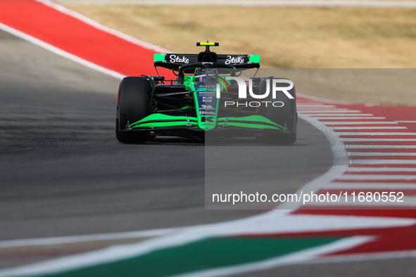 Zhou Guanyu drives in a free practice session at Circuit of the Americas in Austin, United States, on October 18, 2024, during the Formula 1...