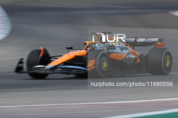 Oscar Piastri drives in a free practice session at Circuit of the Americas in Austin, United States, on October 18, 2024, during the Formula...