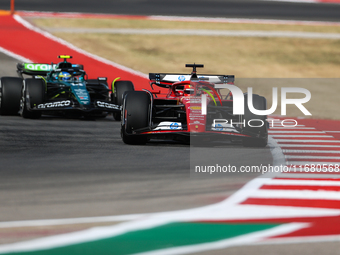 Fernando Alonso and Charles Leclerc drive in a free practice session at Circuit of the Americas in Austin, United States, on October 18, 202...