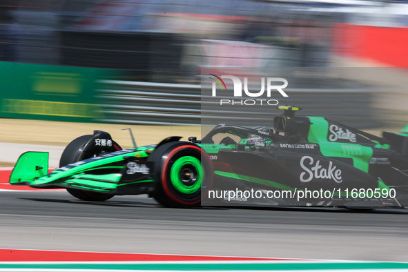 Zhou Guanyu drives in a free practice session at Circuit of the Americas in Austin, United States, on October 18, 2024, during the Formula 1...