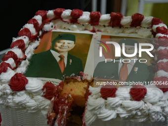 A tart with pictures of Indonesia's new president Prabowo Subianto and vice president Gibran Rakabuming Raka is prepared for a special editi...