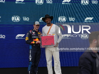 Max Verstappen of the Netherlands drives the Oracle Red Bull Racing RB20 Honda RBPT, and Leo Neugebauer participates during the Formula 1 Pi...