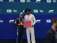 Max Verstappen of the Netherlands drives the Oracle Red Bull Racing RB20 Honda RBPT, and Leo Neugebauer participates during the Formula 1 Pi...