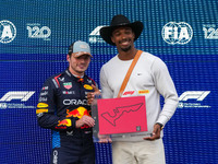 Max Verstappen of the Netherlands drives the Oracle Red Bull Racing RB20 Honda RBPT, and Leo Neugebauer participates during the Formula 1 Pi...