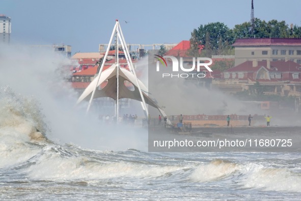 Strong winds create huge waves at the sea in Yantai, China, on October 19, 2024. 