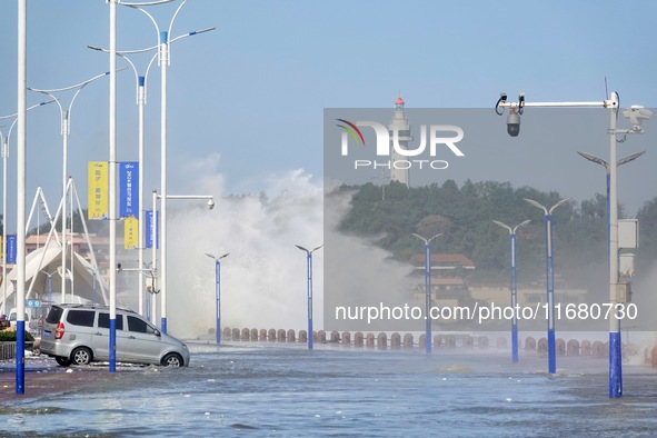 Strong winds create huge waves at the sea in Yantai, China, on October 19, 2024. 