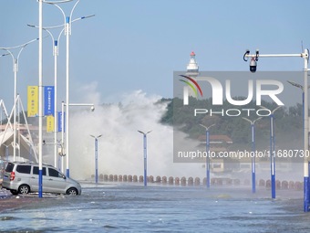 Strong winds create huge waves at the sea in Yantai, China, on October 19, 2024. (