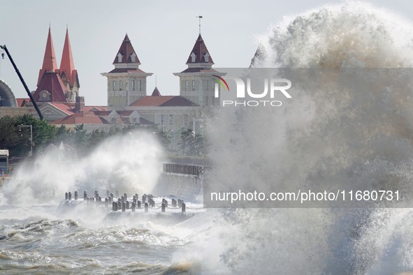 Strong winds create huge waves at the sea in Yantai, China, on October 19, 2024. 