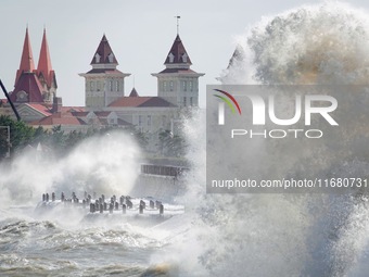 Strong winds create huge waves at the sea in Yantai, China, on October 19, 2024. (