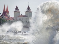 Strong winds create huge waves at the sea in Yantai, China, on October 19, 2024. (