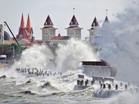 Strong winds create huge waves at the sea in Yantai, China, on October 19, 2024. (