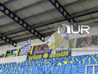 Murals and flags are on display at the ground during the Sky Bet Championship match between Oxford United and West Bromwich Albion at the Ka...