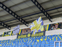 Murals and flags are on display at the ground during the Sky Bet Championship match between Oxford United and West Bromwich Albion at the Ka...