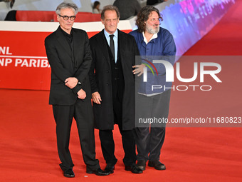 Gilles Bourdos, Vincent Lindon, and Olivier Delbosc attend the ''LE CHOIX DE JOSEPH CROSS'' red carpet during the 19th Rome Film Festival at...