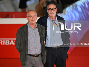 Davide Ferrario and Marco Belpoliti attend the ''ITALO CALVINO NELLE CITTA'' red carpet during the 19th Rome Film Festival at Auditorium Par...