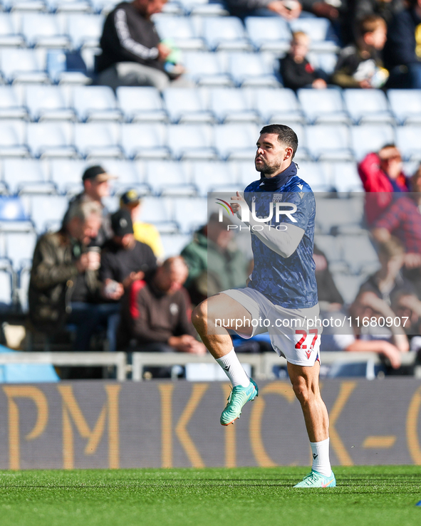 Number 27, Alex Mowatt of WBA, warms up during the Sky Bet Championship match between Oxford United and West Bromwich Albion at the Kassam S...