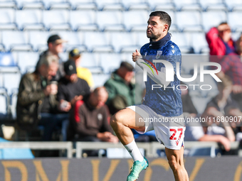 Number 27, Alex Mowatt of WBA, warms up during the Sky Bet Championship match between Oxford United and West Bromwich Albion at the Kassam S...