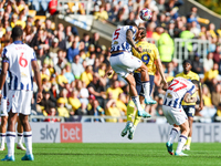 Number 5, Kyle Bartley of WBA, and number 9, Mark Harris of Oxford, battle in the air during the Sky Bet Championship match between Oxford U...