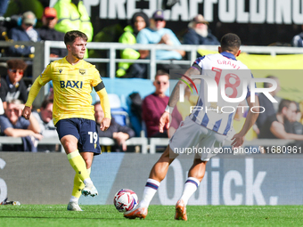 Number 19, Tyler Goodrham of Oxford, is in action during the Sky Bet Championship match between Oxford United and West Bromwich Albion at th...