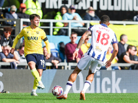 Number 19, Tyler Goodrham of Oxford, is in action during the Sky Bet Championship match between Oxford United and West Bromwich Albion at th...