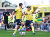 Mark Harris of Oxford (right) is in action during the Sky Bet Championship match between Oxford United and West Bromwich Albion at the Kassa...