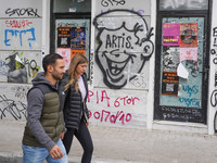 People walk in Athens, Greece, on October 19, 2024. (