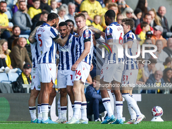 #5, Kyle Bartley congratulates #18, Karlan Grant of WBA (facing camera) for his goal during the Sky Bet Championship match between Oxford Un...