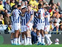 #5, Kyle Bartley congratulates #18, Karlan Grant of WBA (facing camera) for his goal during the Sky Bet Championship match between Oxford Un...