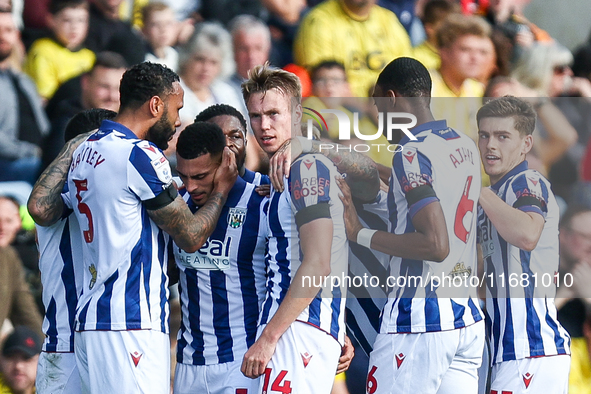 #5, Kyle Bartley congratulates #18, Karlan Grant of WBA (facing camera) for his goal during the Sky Bet Championship match between Oxford Un...