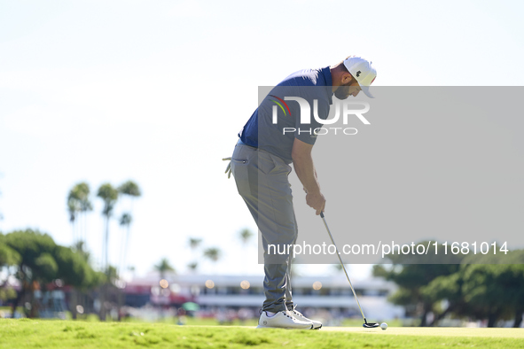 Jon Rahm of Spain plays a shot on the 1st green on the third day of the Estrella Damm N.A. Andalucia Masters 2024 at Real Club de Golf Sotog...