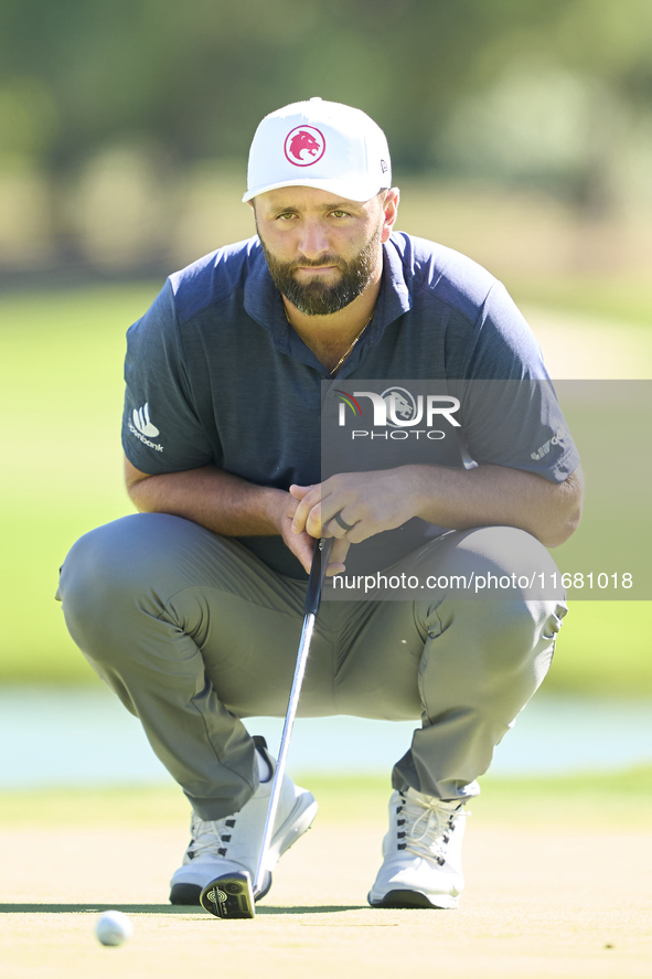 Jon Rahm of Spain studies his shot on the 1st green on the third day of the Estrella Damm N.A. Andalucia Masters 2024 at Real Club de Golf S...