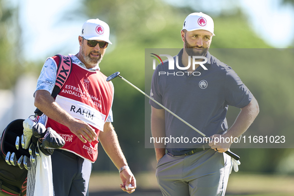 Jon Rahm of Spain and his caddie react on the 1st green on the third day of the Estrella Damm N.A. Andalucia Masters 2024 at Real Club de Go...