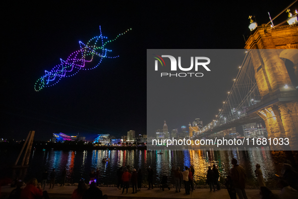 Spectators see the drone light show at the 2024 Blink Art and Light Festival in Cincinnati, Ohio, on October 18, 2024. 