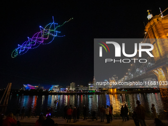 Spectators see the drone light show at the 2024 Blink Art and Light Festival in Cincinnati, Ohio, on October 18, 2024. (