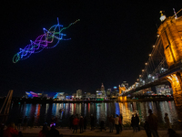 Spectators see the drone light show at the 2024 Blink Art and Light Festival in Cincinnati, Ohio, on October 18, 2024. (