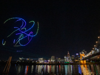 Spectators see the drone light show at the 2024 Blink Art and Light Festival in Cincinnati, Ohio, on October 18, 2024. (