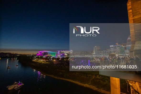 Paycor Stadium is lit up in neon during the 2024 Blink Art and Light Festival in Cincinnati, Ohio, on October 18, 2024. 