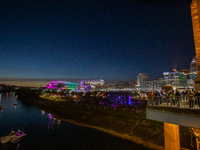 Paycor Stadium is lit up in neon during the 2024 Blink Art and Light Festival in Cincinnati, Ohio, on October 18, 2024. (