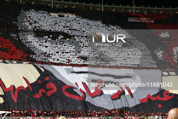 USM Alger fans cheer for their team during the football match between USM Alger and CR Belouizdad on the 5th day of the Algerian Ligue 1 cha...