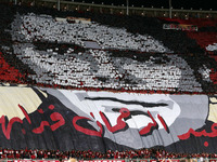 USM Alger fans cheer for their team during the football match between USM Alger and CR Belouizdad on the 5th day of the Algerian Ligue 1 cha...