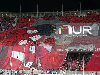 CR Belouizdad fans applaud their team during the football match between USM Alger and CR Belouizdad on the 5th day of the Algerian Ligue 1 c...