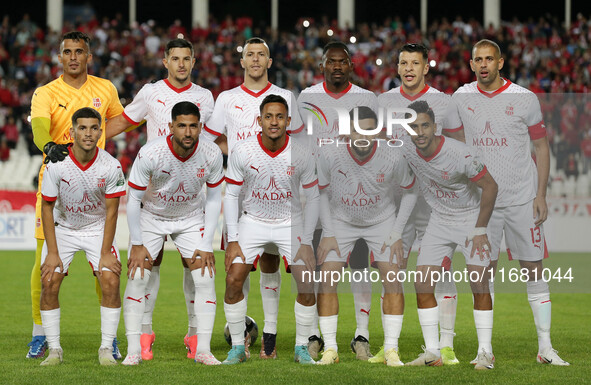 The starting players of CR Belouizdad pose for a group photo before the football match between USM Alger and CR Belouizdad on the 5th day of...