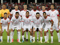 The starting players of CR Belouizdad pose for a group photo before the football match between USM Alger and CR Belouizdad on the 5th day of...