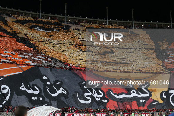 USM Alger fans cheer for their team during the football match between USM Alger and CR Belouizdad on the 5th day of the Algerian Ligue 1 cha...