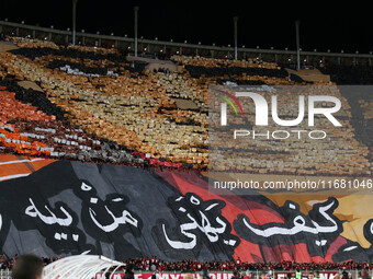 USM Alger fans cheer for their team during the football match between USM Alger and CR Belouizdad on the 5th day of the Algerian Ligue 1 cha...