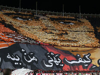 USM Alger fans cheer for their team during the football match between USM Alger and CR Belouizdad on the 5th day of the Algerian Ligue 1 cha...