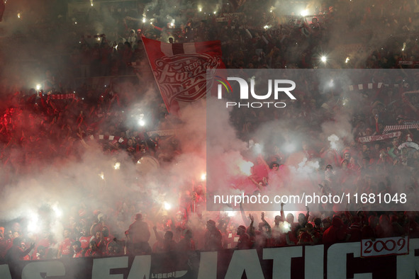 CR Belouizdad fans applaud their team during the football match between USM Alger and CR Belouizdad on the 5th day of the Algerian Ligue 1 c...