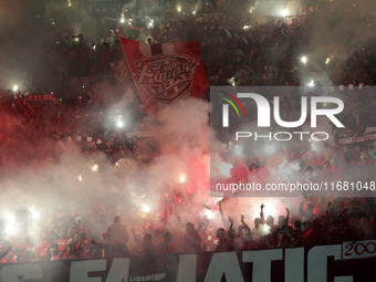 CR Belouizdad fans applaud their team during the football match between USM Alger and CR Belouizdad on the 5th day of the Algerian Ligue 1 c...